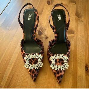 Zara leopard print heeled sandals.